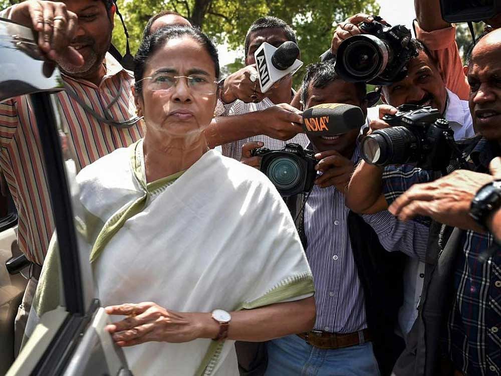 West Bengal chief minister and Trinamool supremo Mamata Banerjee arrives at the Parliament in New Delhi on Tuesday. PTI Photo