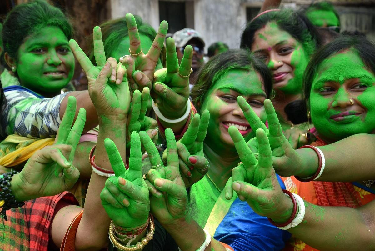 All India Trinamool Congress supporters celebrate during Panchayat poll election results. PTI File Photo