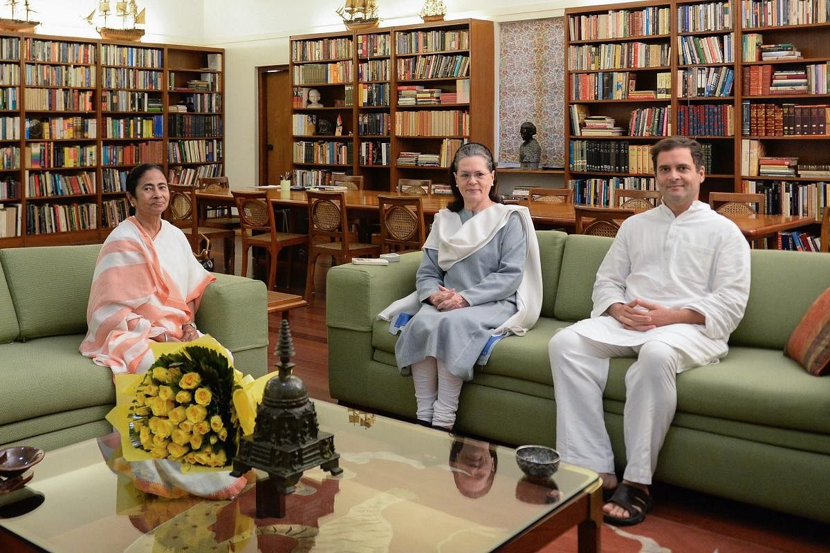 File photo of TMC chief Mamata Banerjee with UPA chief Sonia Gandhi and Congress president Rahul Gandhi. The Congress in West Bengal is wary of a TMC-Congress alliance for the 2019 Lok Sabha Polls. PTI file photo