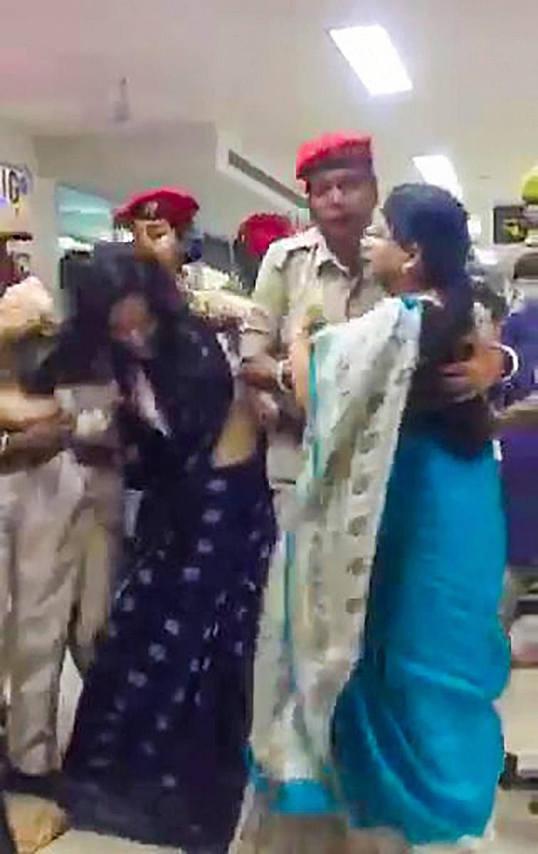 *BEST QUALITY AVAILABLE** Silchar: Trinamool Congress delegation being stopped by Assam Police as they arrived to assess the situation in Assam in the wake of the publication of the complete draft of the NRC, at Kumbhirgram airport in Silchar on Thursday,