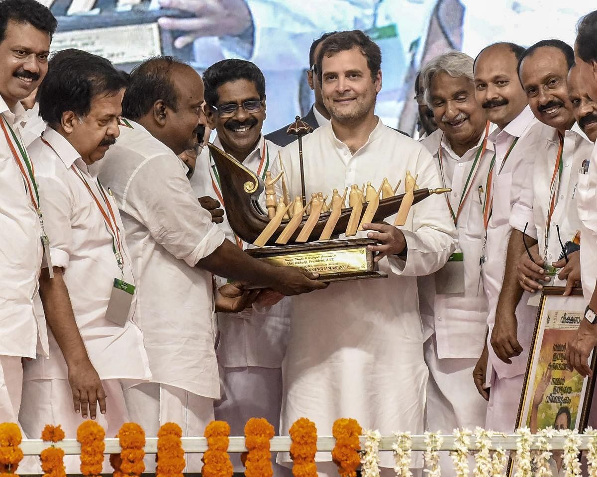 Congress president Rahul Gandhi being presented a memento at the party's state level convention near Marine Drive in Kochi on January 29. PTI