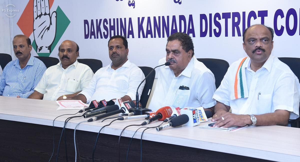 B Ramanath Rai, president of the Dakshina Kannada Lok Sabha constituency Coalition Publicity Committee, addresses reporters in Mangaluru on Wednesday.