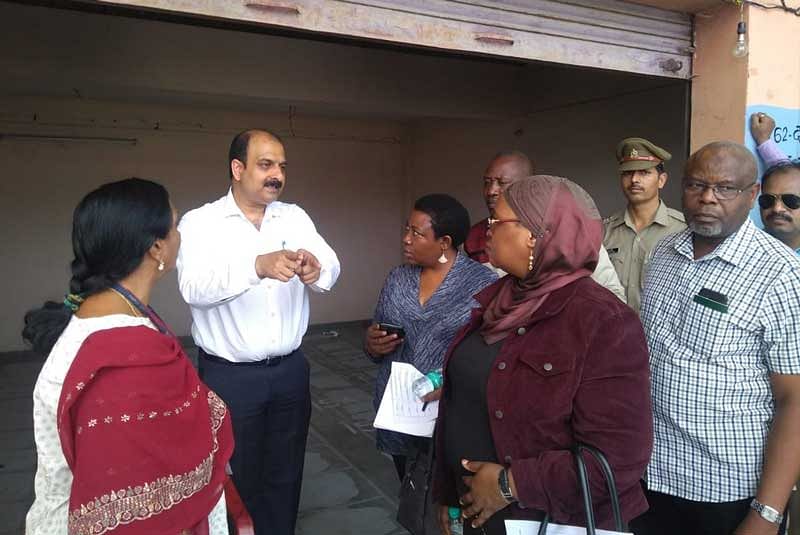 The four-member delegation visited four polling booths, including one critical, with three of them in Noida and the rest in Greater Noida, the officials said. (Image courtesy Twitter)