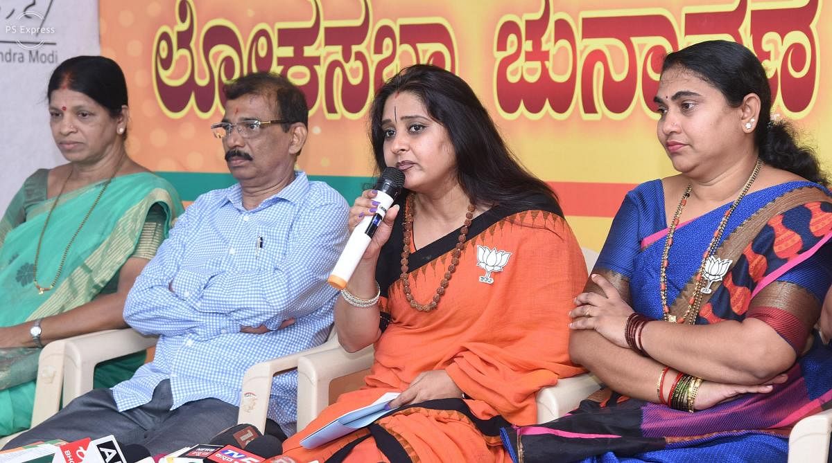 BJP state committee spokesperson Malavika Avinash speaks at a press conference at BJP election office in Mangaluru on Thursday.