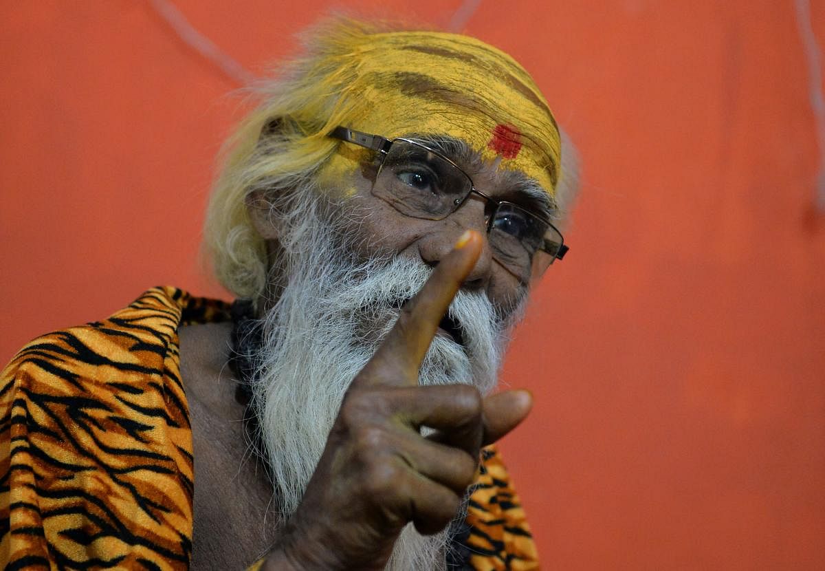 In this photo taken on April 3, 2019, Indian priest Fakkad Baba, who will contest the upcoming elections for the national parliament, speaks during an interview with AFP in Mathura in Uttar Pradesh state. - This election will be Baba's 17th on the ballot.