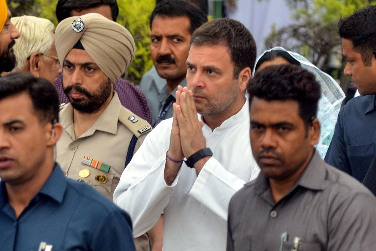 Indian National Congress party president Rahul Gandhi gestures after laying a wreath to pay tribute on the 100th anniversary of the Jallianwala Bagh massacre at the Jallianwala Bagh martyrs memorial in Amritsar on April 13, 2019. AFP Photo