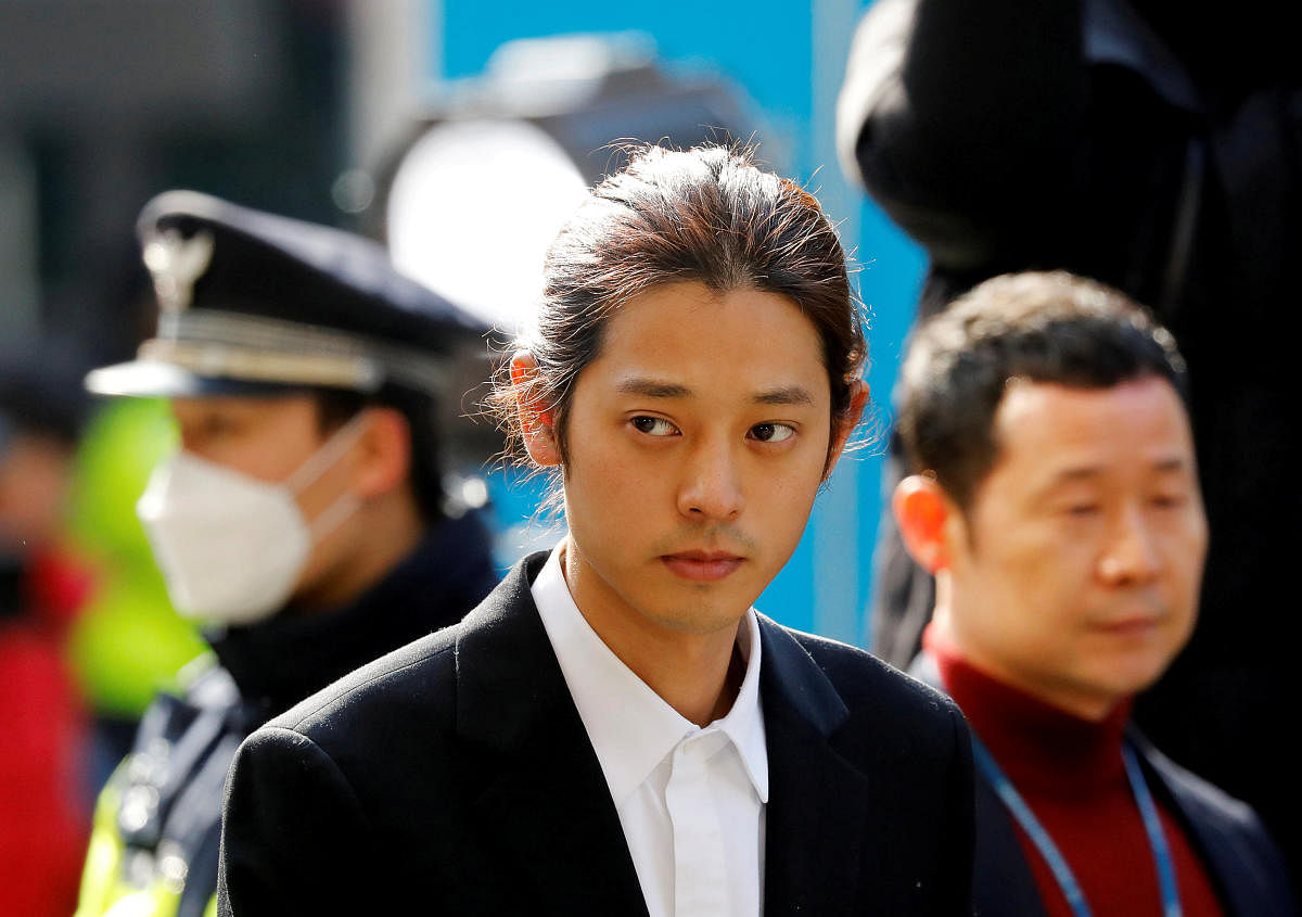 South Korean singer Jung Joon-young arrives for questioning on accusations of illicitly taping and sharing sex videos on social media, at the Seoul Metropolitan Police Agency in Seoul. Reuters file photo