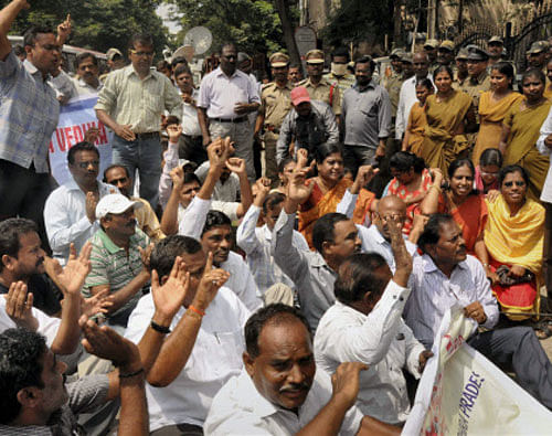 The YSR Congress Party's (YSRCP) 15 legislators were Thursday suspended from the Andhra Pradesh state  assembly for a day for stalling the house as they opposed the proposed bifurcation of the state. PTI File Photo
