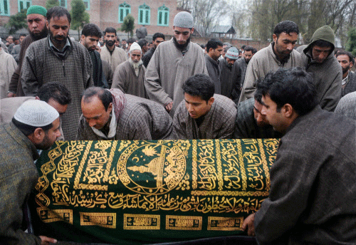 People carry the coffin of PDP Sarpanch Mohammad Amin Pandit, who was killed at Gulzarpora  on Friday. PTI  photo