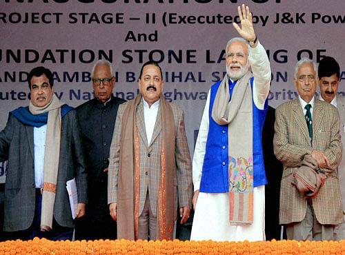 Prime Minister Narendra Modi with Union Transport Minister Nitin Gadkari, MoS Jitendra Kumar and Jammu & Kashmir Chief Minister Mufti Mohammed Sayeed at a public rally during the inauguration of 450 MW Baglihar Hydro Electric Project Stage-II, at Charankote in Ramban on Saturday. PTI Photo