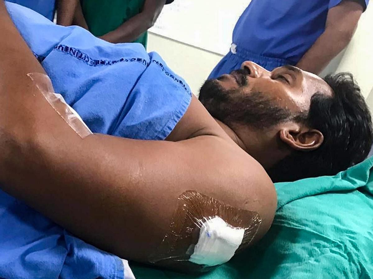 YSR Congress Party Chief Jagan Mohan Reddy, who was stabbed on his arm in the VIP lounge of Visakhapatnam Airport, at a hospital in Hyderabad on Oct 25, 2018. PTI