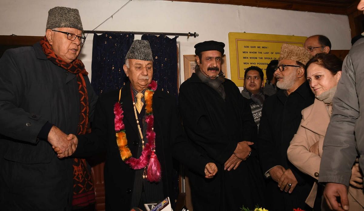 Basharat Bukhari and Peer Muhammad Hussain joined National Conference in the presence of NC president Dr Farooq Abdullah and vice president Omar Abdullah. (DH Photo)