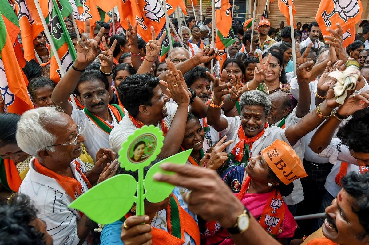 AIADMK supporters during an election campaign led by Deputy Chief Minister of Tamil Nadu O Panneerselvam in Chennai, Friday, April 05, 2019. (PTI Photo)