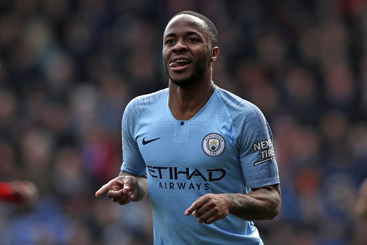 ON TARGET: Manchester City's Raheem Sterling celebrates after scoring their second goal against Crystal Palace. AFP 