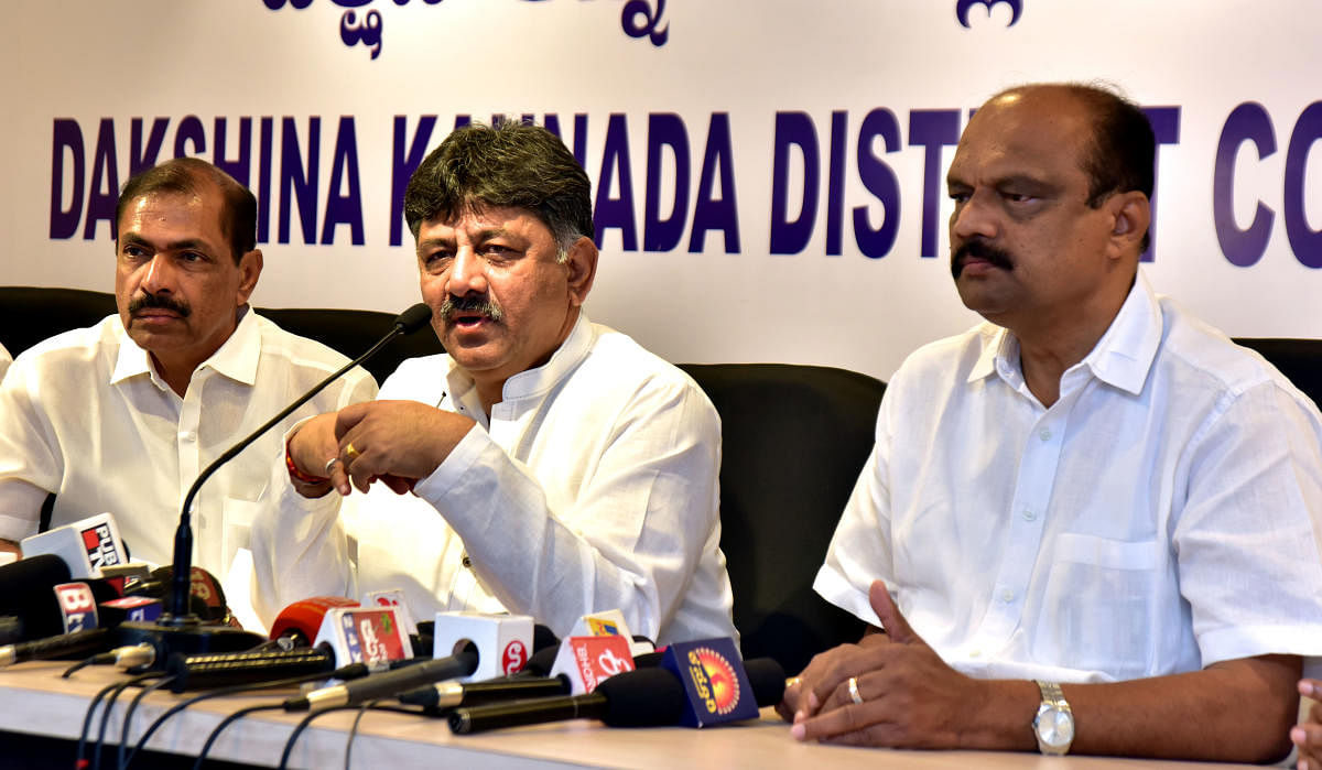 Minister for Water Resources D K Shivakumar speaks to reporters in Mangaluru on Monday.