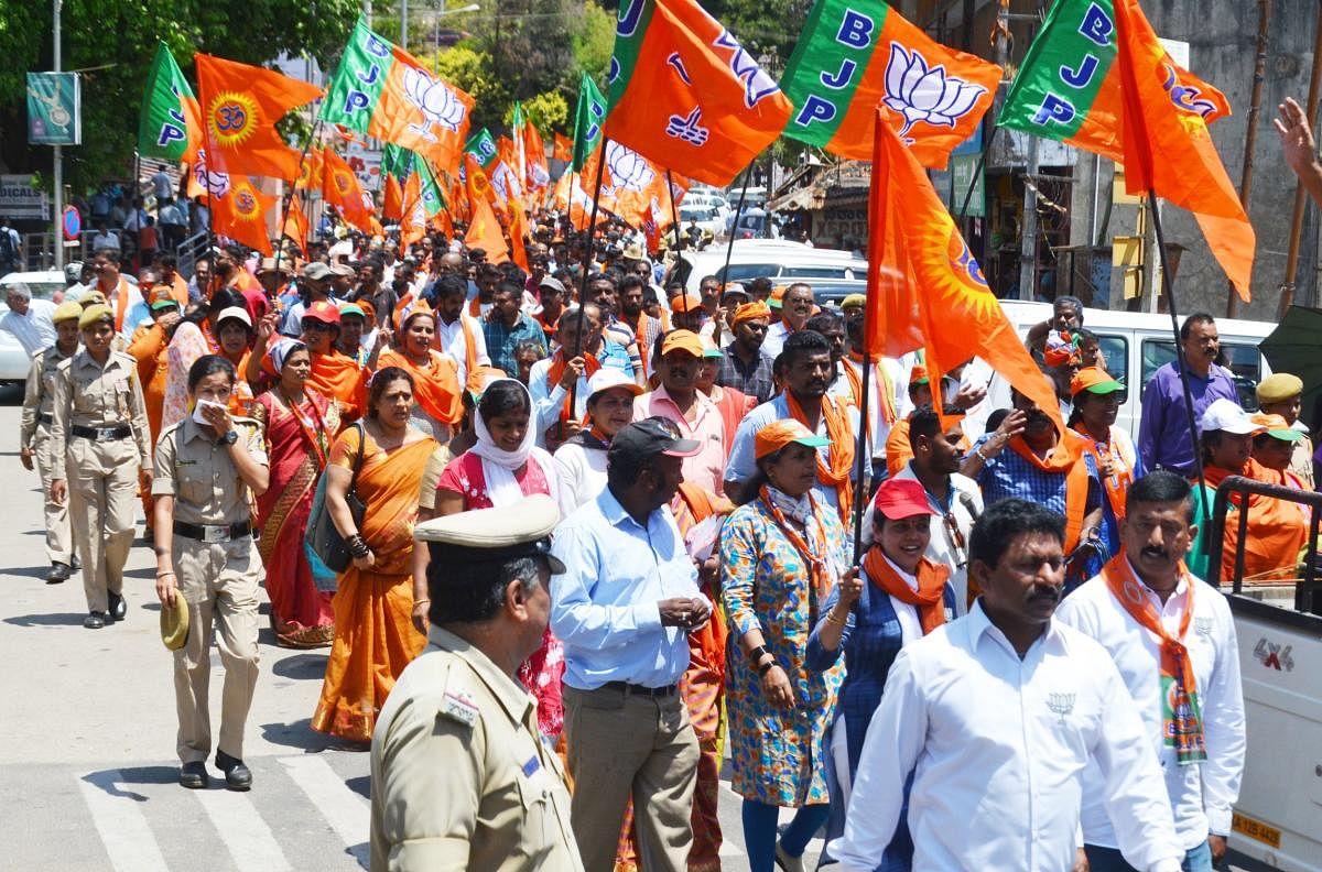 BJP workers took out a rally in Madikeri on Tuesday.