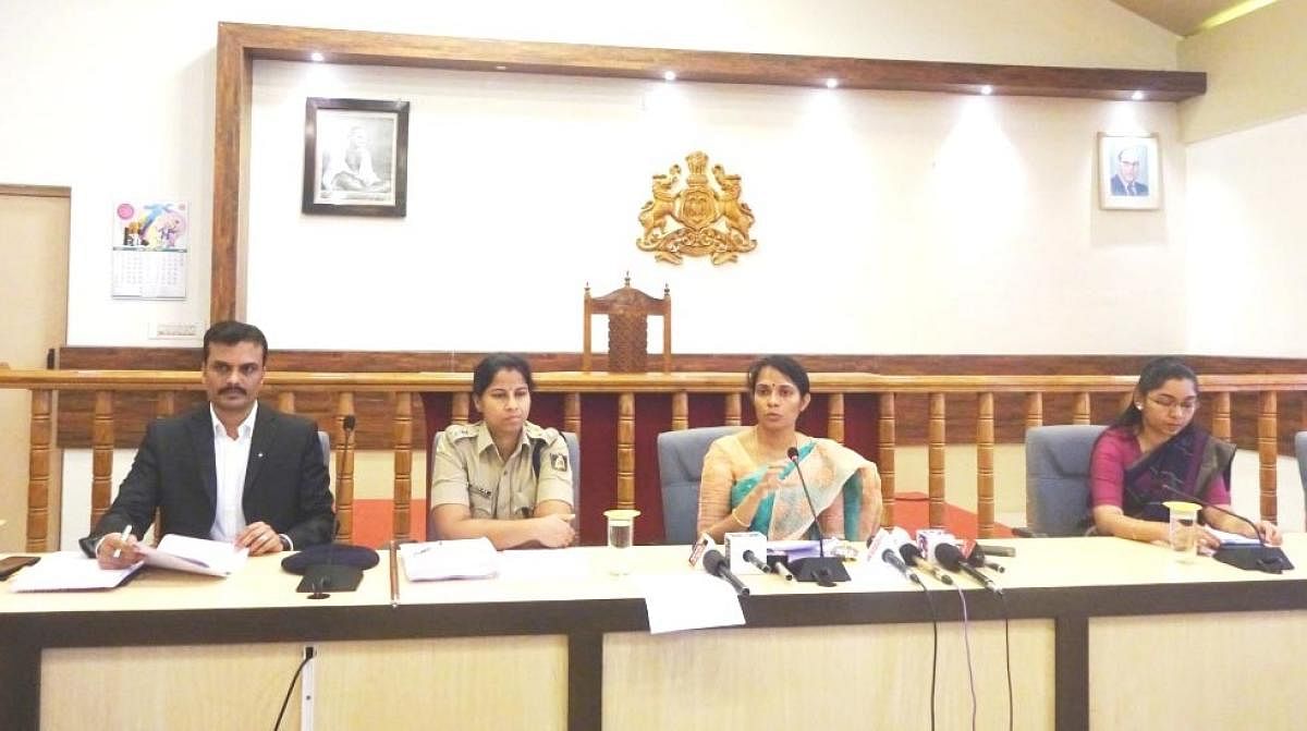District Election Officer and Deputy Commissioner Annies Kanmani Joy briefs reporters at her office in Madikeri on Tuesday. Additional Deputy Commissioner P Shivaraju, Superintendent of Police Dr Suman D Pennekar and ZP CEO K Laksmi Priya look on.