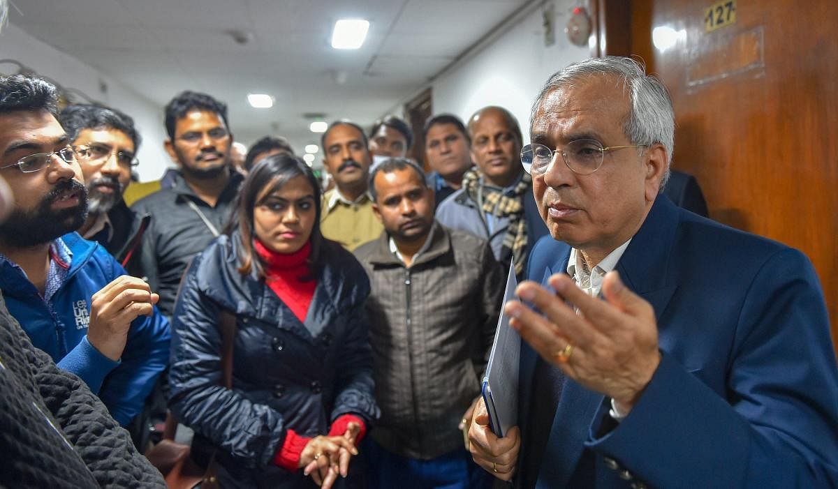 New Delhi: NITI Aayog Vice Chairman Rajiv Kumar surrounded by the media persons after a press conference, in New Delhi, Thursday, Jan. 31, 2019. (PTI Photo/Kamal Kishore) (PTI1_31_2019_000183A)