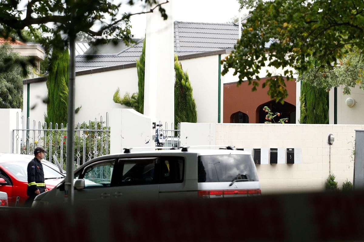 Security officials guards one the mosque Masjif Al-Noor after a gunman filmed himself firing at worshippers inside in Christchurch on March 15, 2019. - A gunman opened fire inside the Masjid al Noor mosque during afternoon prayers, causing multiple fatalities. (AFP)