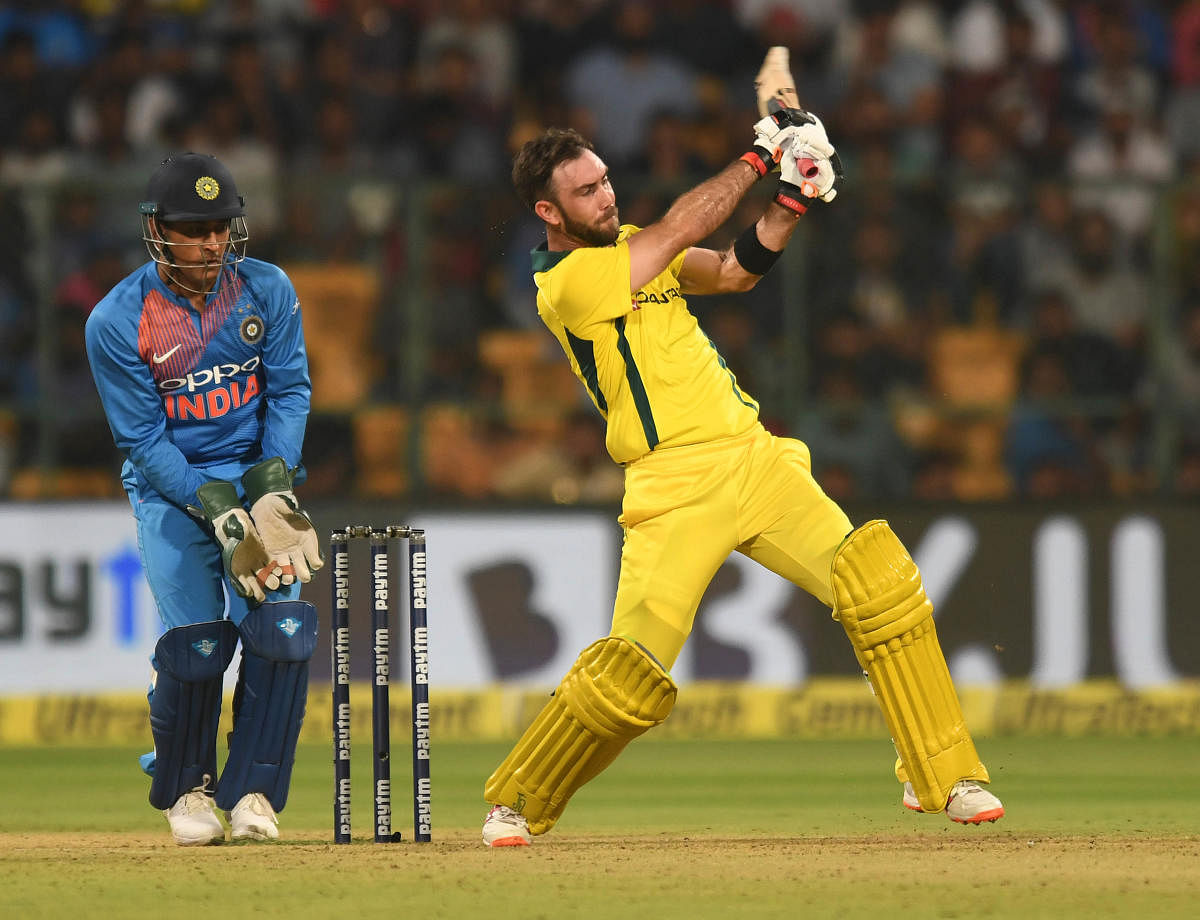 IN PUNISHING MOOD Australia's Glenn Maxwell put on show a brilliant power-hitting to guide Australia to T20 series win over India. DH Photo/ Srikanta Sharma R