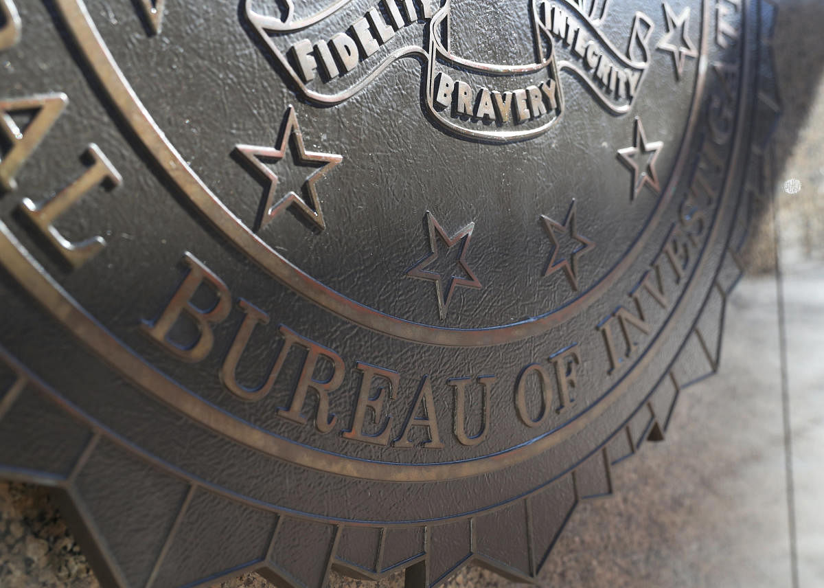 The crest for the Department of Justice, Federal Bureau of Investigations is seen on the outside of the J. Edgar Hoover FBI Building in Washington, U.S., March 12, 2019. REUTERS/Leah Millis