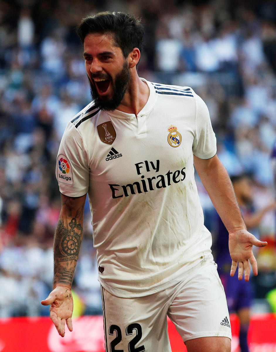 Real Madrid's Isco celebrates after scoring against Celta Vigo on Sunday. REUTERS