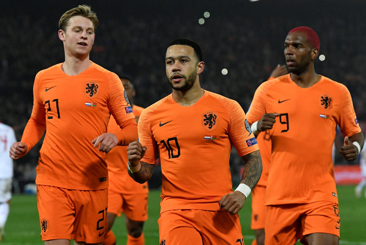 The Netherlands' Memphis Depay (centre) celebrates after scoring against Belarus during their Euro 2020 qualifying match on Thursday night. REUTERS