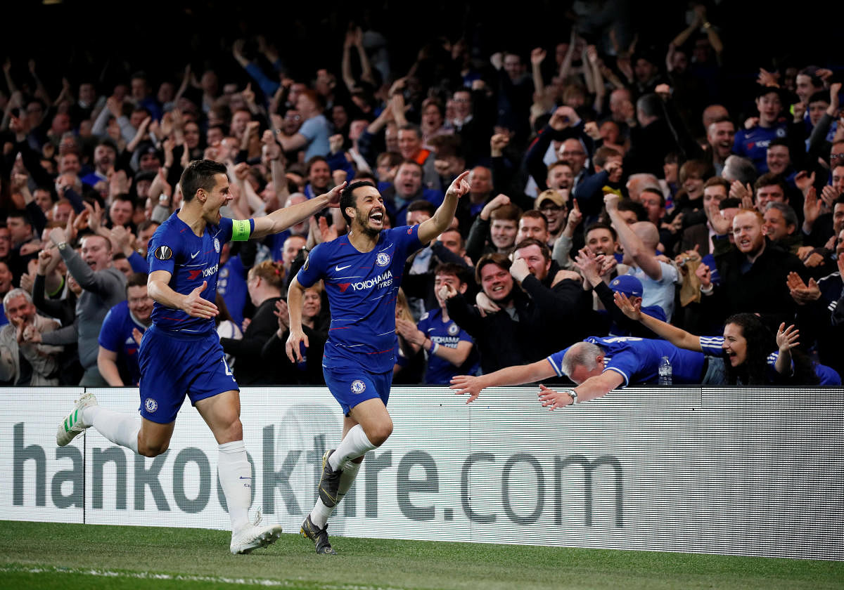 Chelsea's Pedro Rodriguez (right) celebrates with Cesar Azpilicueta after scoring against Slavia Prague on Thursday. Reuters