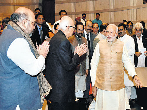 Prime Minister Narendra Modi, BJP president Amit Shah and L K Advani at the BJP parliamentary party meeting in New Delhi on Tuesday. PTI