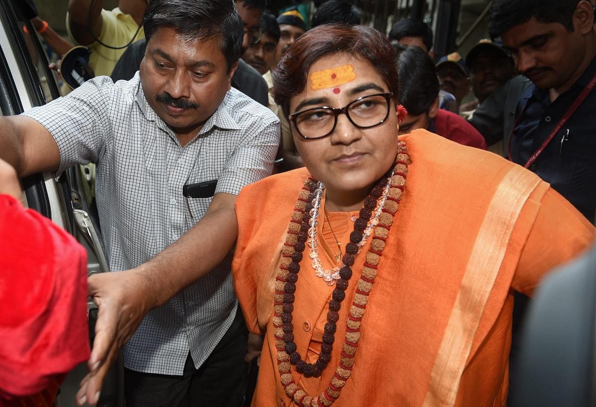 The 2008 Malegaon blast case accused Sadhvi Pragya Singh Thakur leaves the special NIA court after she was charged for terror conspiracy, murder, and other related offenses, in Mumbai, Tuesday, Oct 30, 2018. (PTI Photo/Shashank Parade)