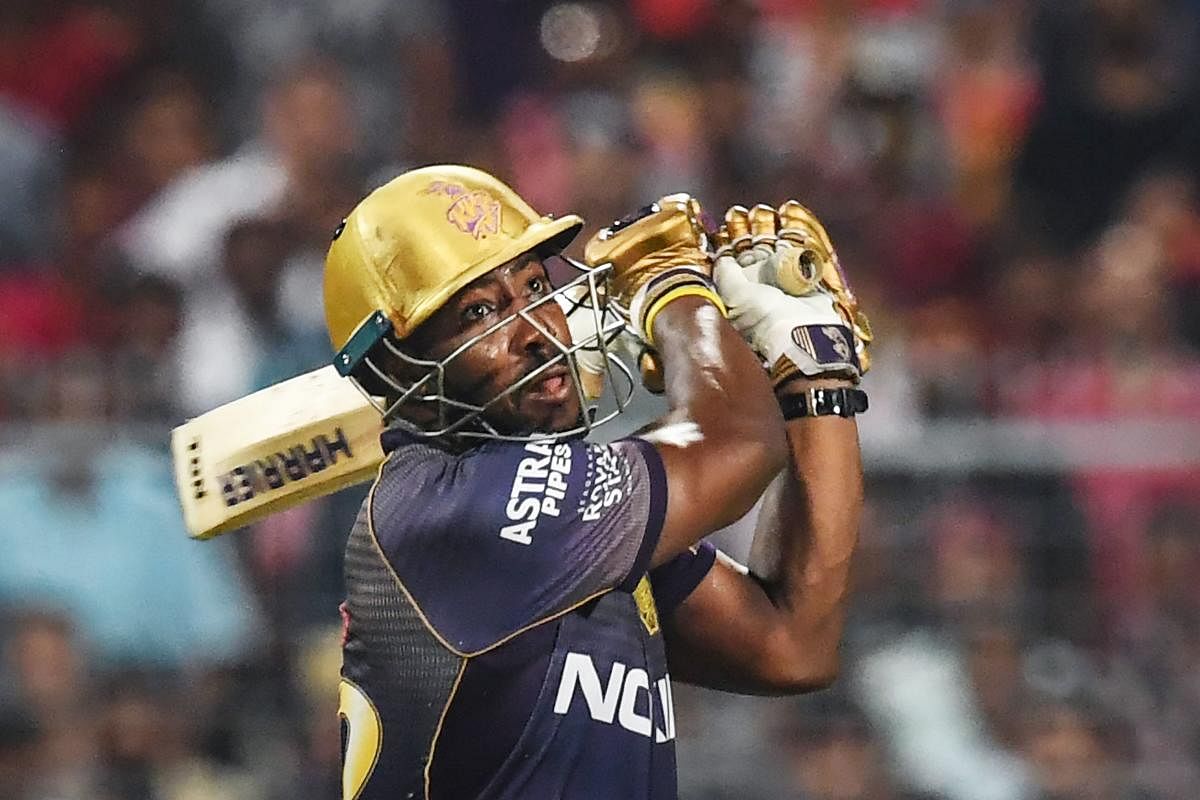 MARAUDING: Kolkata Knight Riders' Andre Russell felt his team should have scored at a faster clip in the middle overs against RCB. AFP 