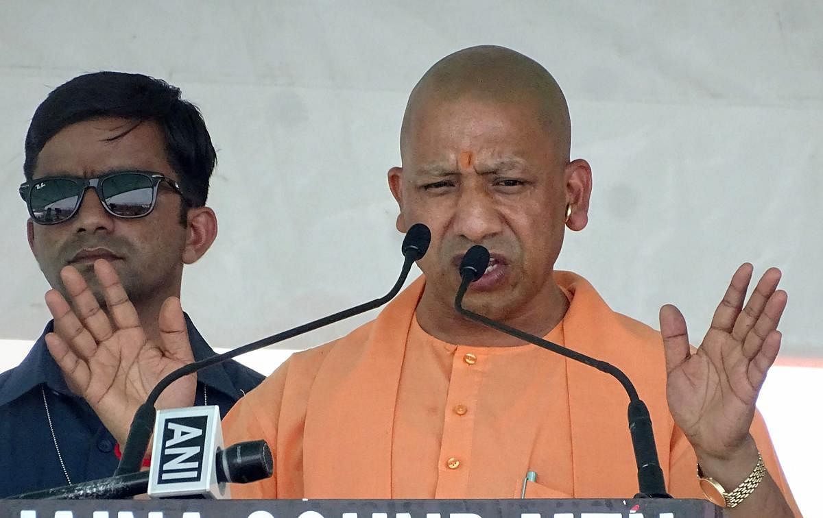 Uttar Pradesh Chief Minister Yogi Adityanath addresses during a election campaign rally for BJP parliamentary candidate from Rampur, Jaya Prada, ahead of the Lok Sabha elections, in Rampur, Sunday, April 21, 2019. (PTI Photo)