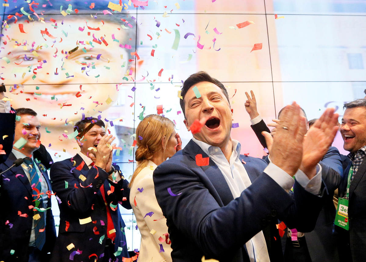 Ukrainian presidential candidate Volodymyr Zelenskiy reacts following the announcement of the first exit poll in a presidential election at his campaign headquarters in Kiev, Ukraine. (Reuters Photo)