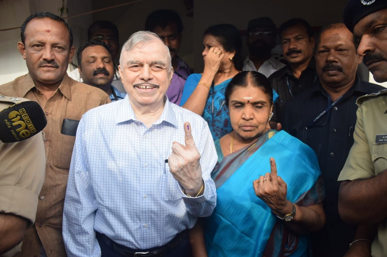 Kerala Governor P Sathasivam and his wife after casting votes in Thiruvananthapuram. (DH Photo)