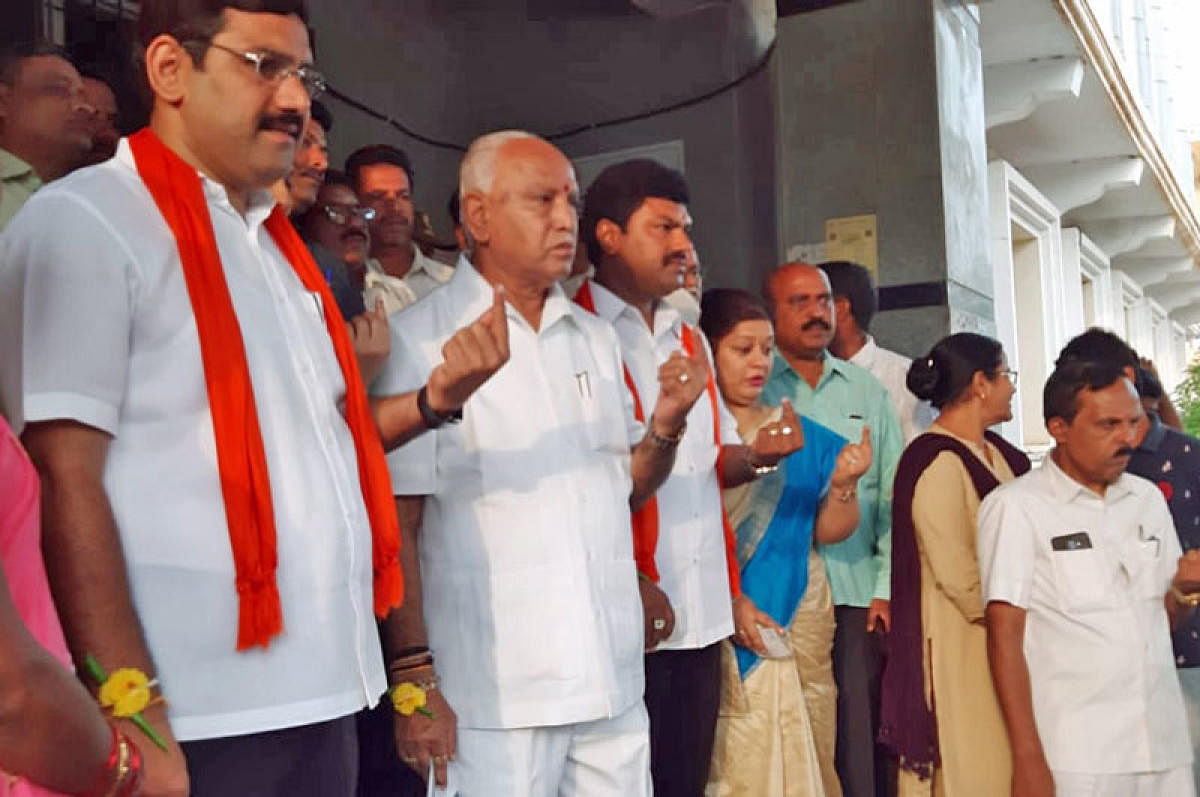 BJP state president B S Yeddyurappa after casting his vote. (DH Photo)