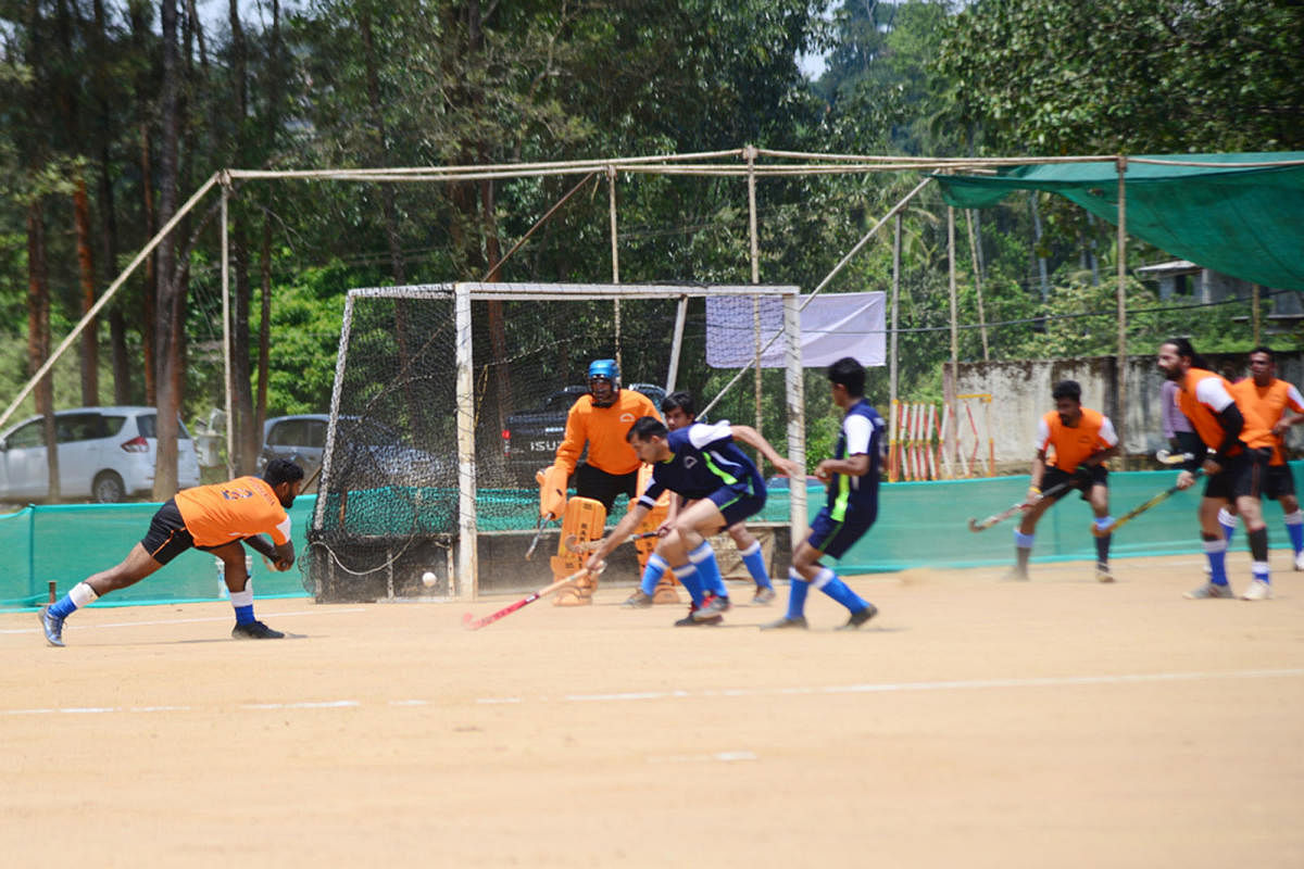 Pasoora and Muddanda teams during their match at General K S Thimayya stadium in Napoklu on Tuesday.
