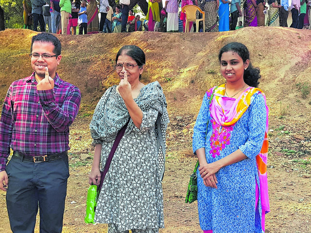 Vinith and Soumya couple flew from Czech Republic to cast their votes in Harihar and Sirsi, respectively. (Centre) Niharik Sasihittal, an engineer based in the US, and his mother Mangala, cast their votes in Dharwad. His wife Preksha will exercise her fra