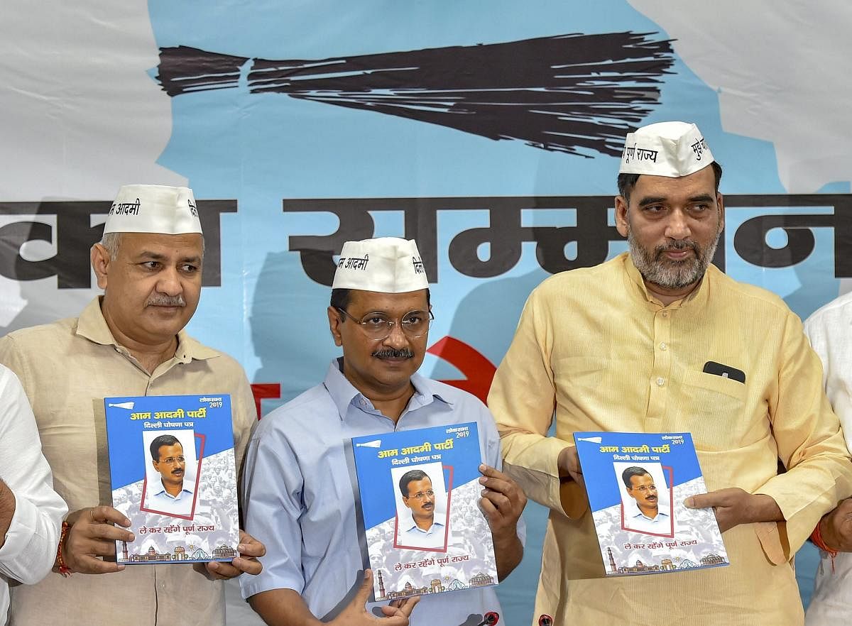  Aam Aadmi Party (AAP) President and Delhi Chief Minister Arvind Kejriwal along with party leaders Manish Sisodia, Sanjay Singh, Gopal Rai and others release AAP's election manifesto for the forthcoming Lok Sabha polls in New Delhi. PTI photo