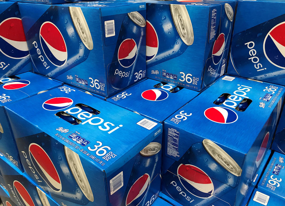 FILE PHOTO: Cases of Pepsi are shown for sale at a store in Carlsbad, California, U.S., April 22, 2017. REUTERS/Mike Blake/File Photo GLOBAL BUSINESS WEEK AHEAD