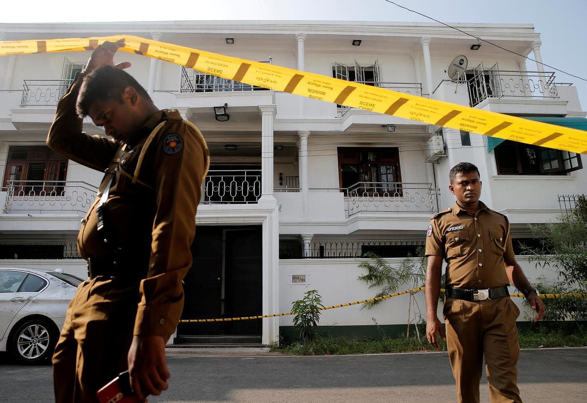 Police keep watch outside the family home of a bomber suspect where an explosion occurred during a Special Task Force raid, following a string of suicide attacks on churches and luxury hotels, in Colombo, Sri Lanka April 25, 2019. (Reuters)