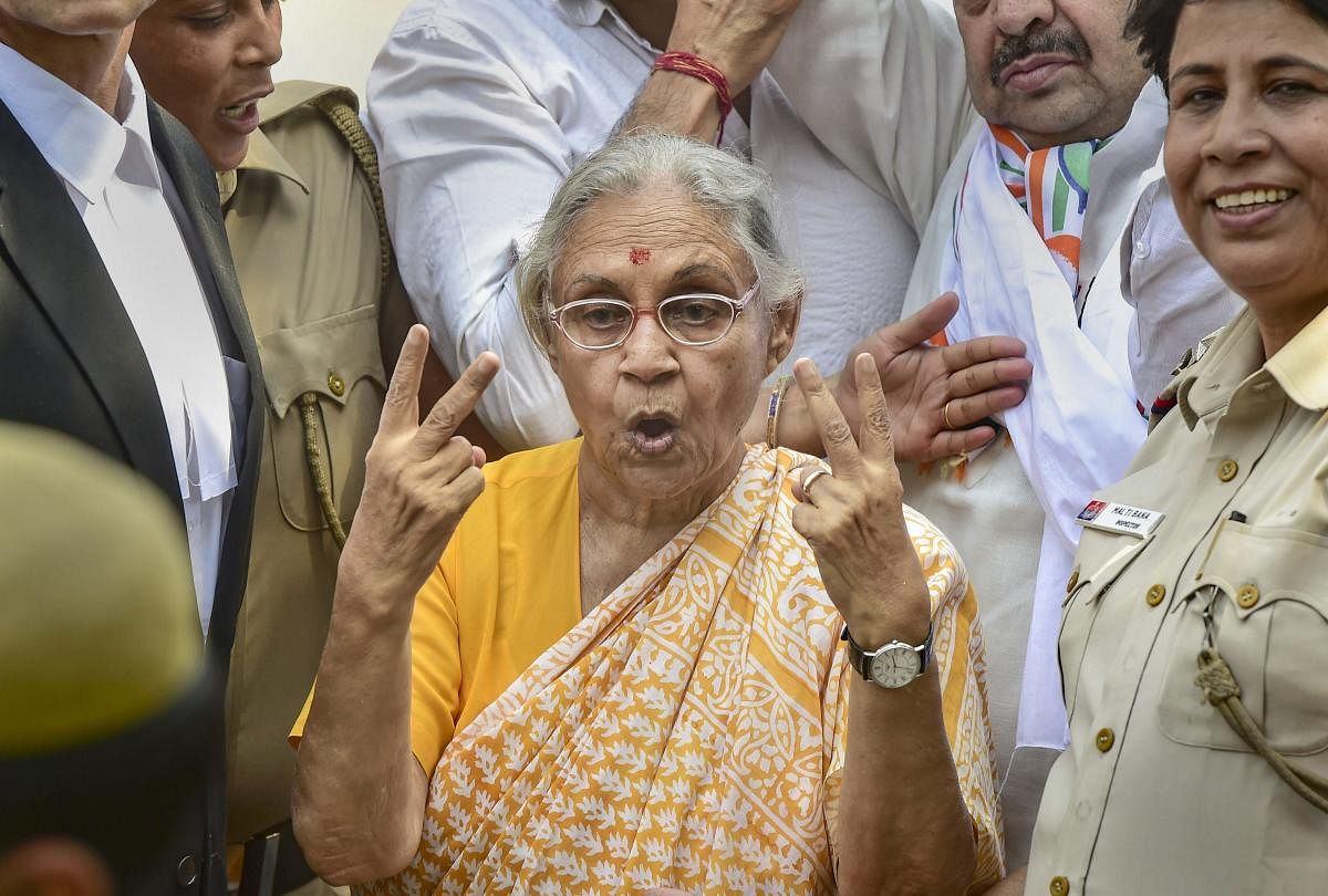 DPCC President Sheila Dikshit flashes the victory sign as she leaves after filing her nomination papers from North East Delhi parliamentary seat, in New Delhi, Tuesday, April 23, 2019. 