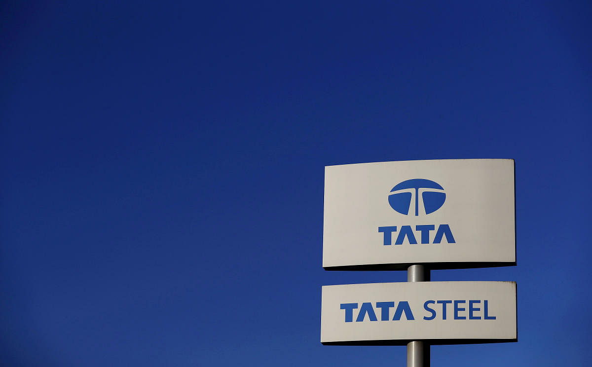 FILE PHOTO: A company logo is seen outside the Tata steelworks near Rotherham in Britain. Reuters