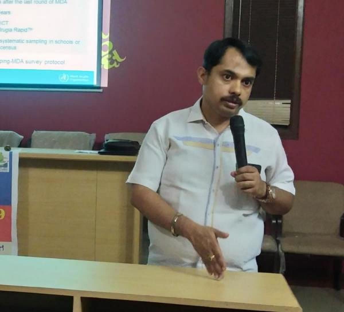 Medical Officer Dr Prashanth Bhat addresses the gathering at the Press Club in Udupi on Thursday.