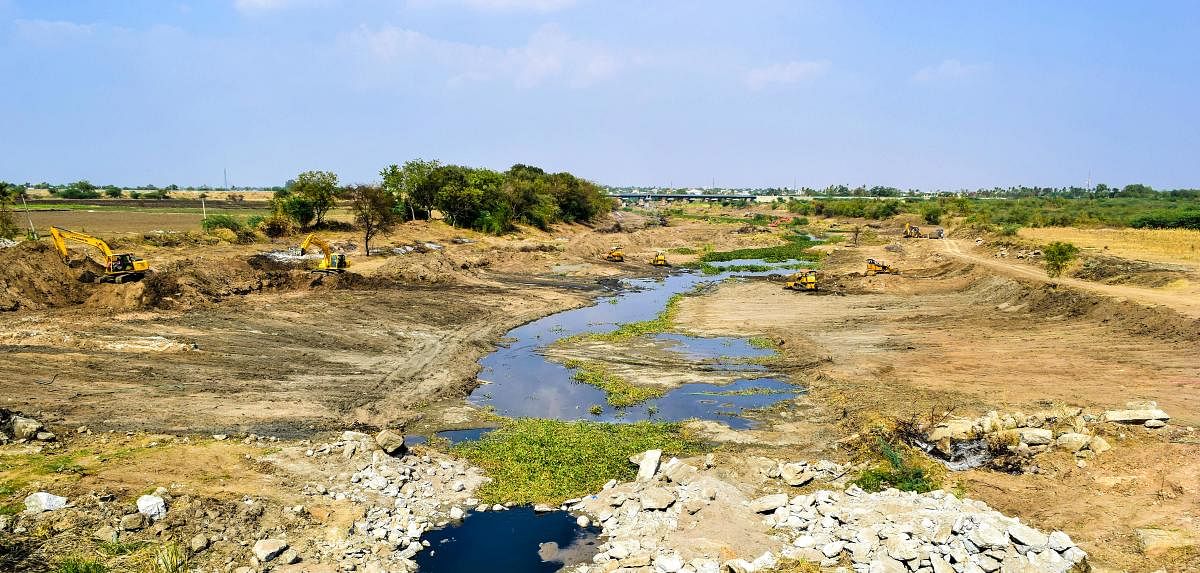 Breathing FResh LIfe: (Clockwise from above) Hirehalla in Koppal district after one month of cleaning; volunteers clearing trash and weeds in the stream; earthmoving vehicles are used to accelerate the process.