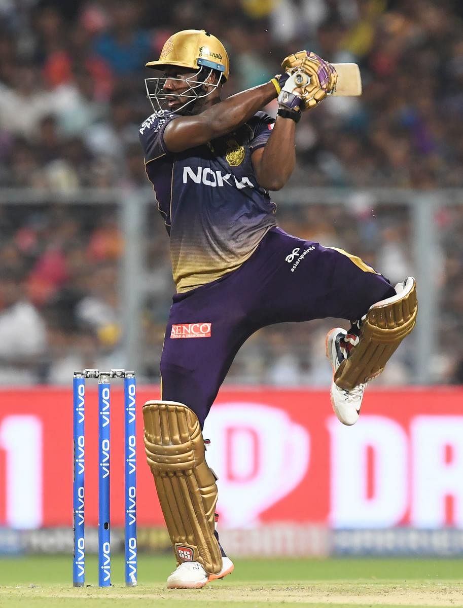 Kolkata Knight Riders' Andre Russell hits one to the boundary during his unbeaten 80 on Sunday. AFP