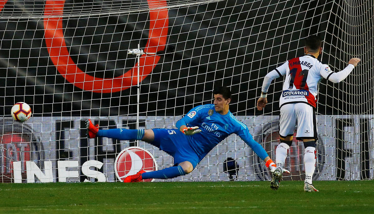Rayo Vallecano's Adri Embarba scores from the penalty spot against Real Madrid on Sunday. REUTERS