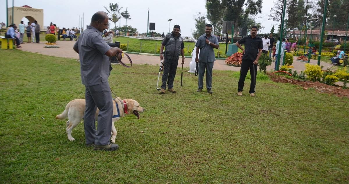 A sniffer dog deployed at Raja Seat in Madikeri.