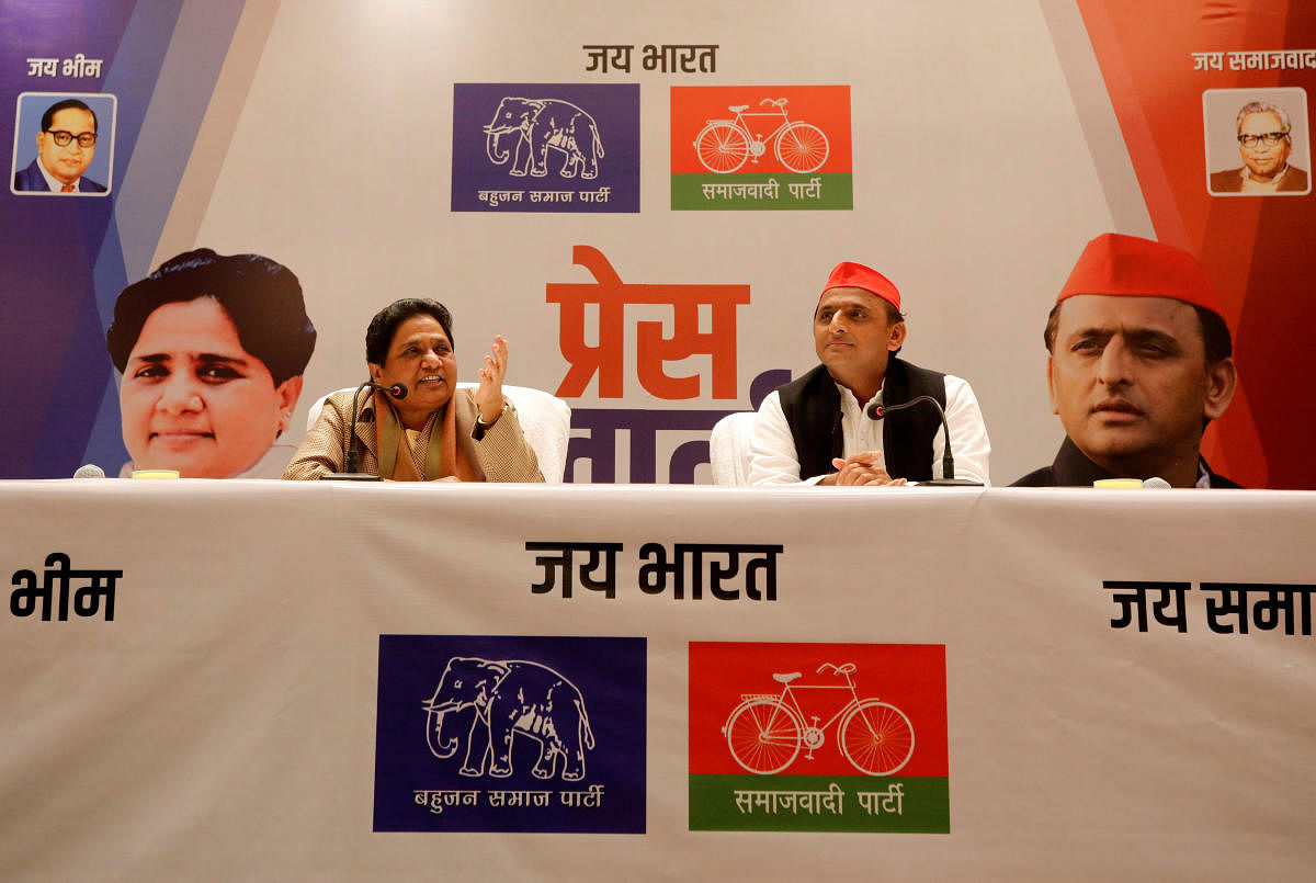 BSP chief Mayawati speaks as Akhilesh Yadav, chief of SP, looks on during a joint news conference to announce their alliance for the upcoming national election, in Lucknow. Reuters photo