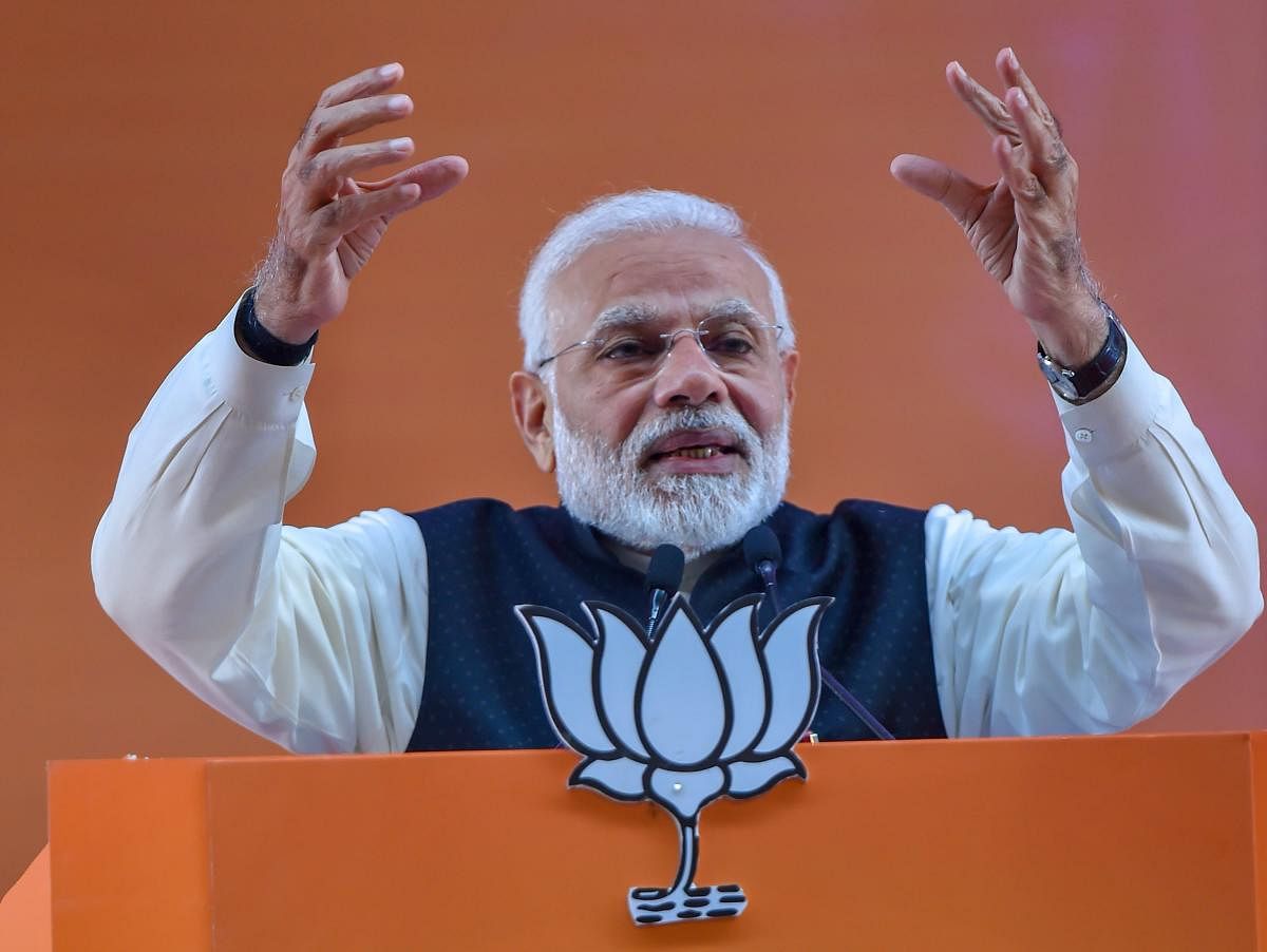 Prime Minister Narendra Modi addresses on the second day of the two-day BJP National Convention, at Ramlila Ground in New Delhi on Saturday. PTI photo