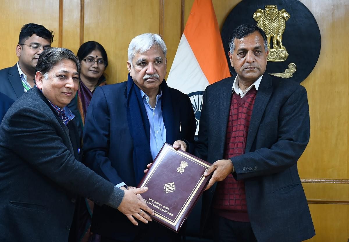 A committee examining Section 126 of the Representation of the People Act 1951 and other related provisions submit the report to Chief Election Commissioner Sunil Arora and Election Commissioner Ashok Lavasa, in New Delhi, on Thursday. PTI